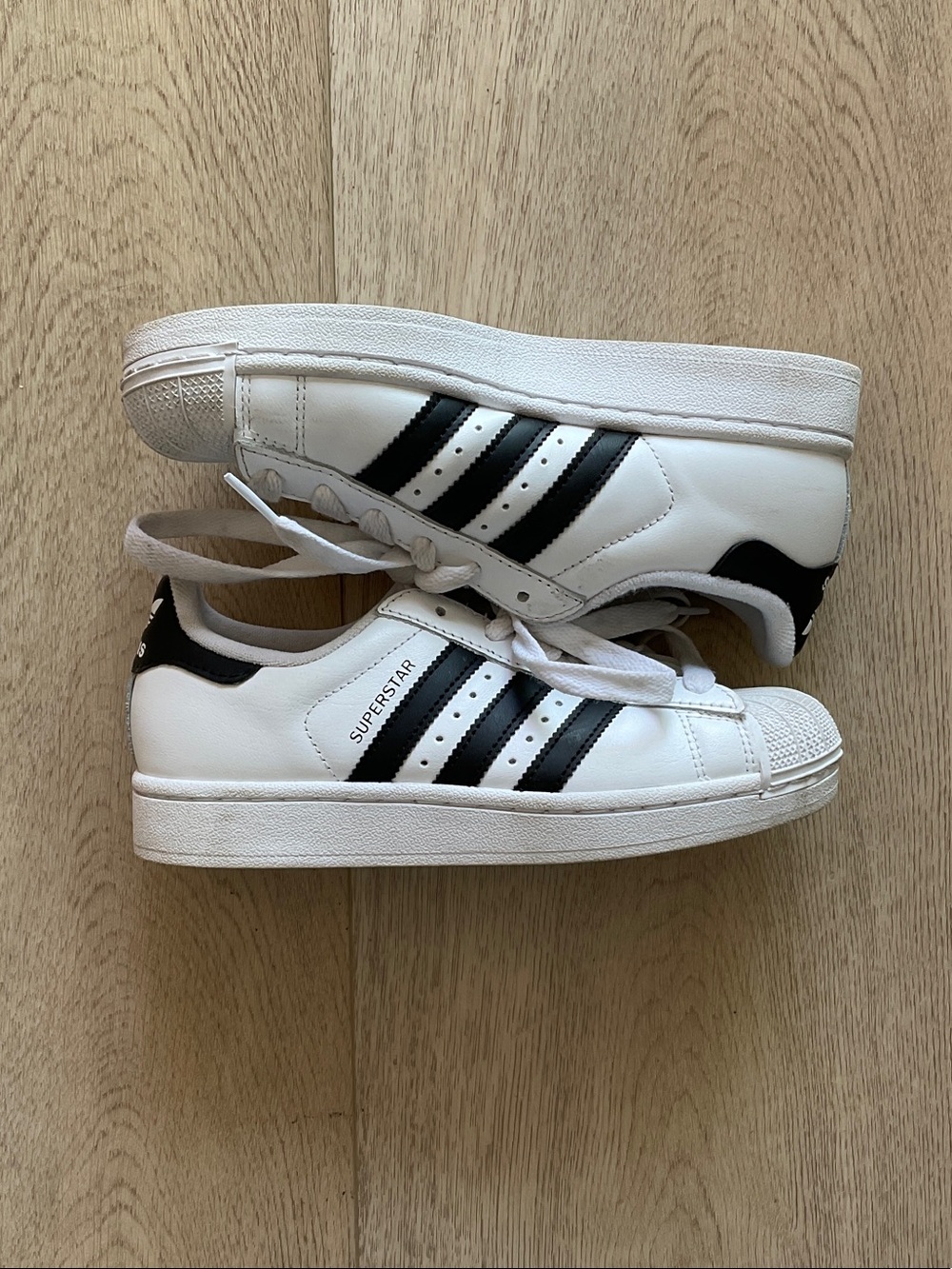 adidas White and Black Superstar Leather Sneakers